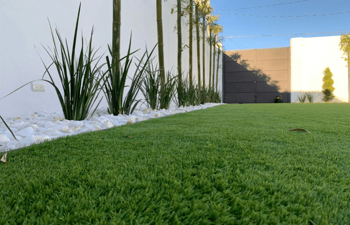 Pasto sintético para paisajismo